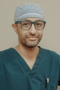 Professional portrait of Dr. Ahmed Fadl, MD, an expert in interventional radiology, specializing in minimally invasive procedures for treating various conditions